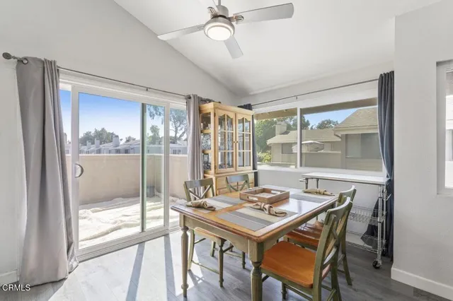 a bedroom with bed and a window