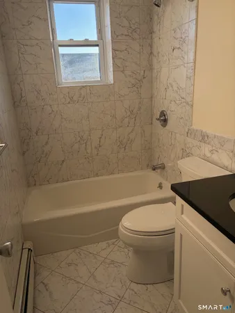 a view of a terrace with seating area