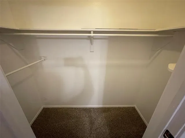 a view of small space with racks on the wall