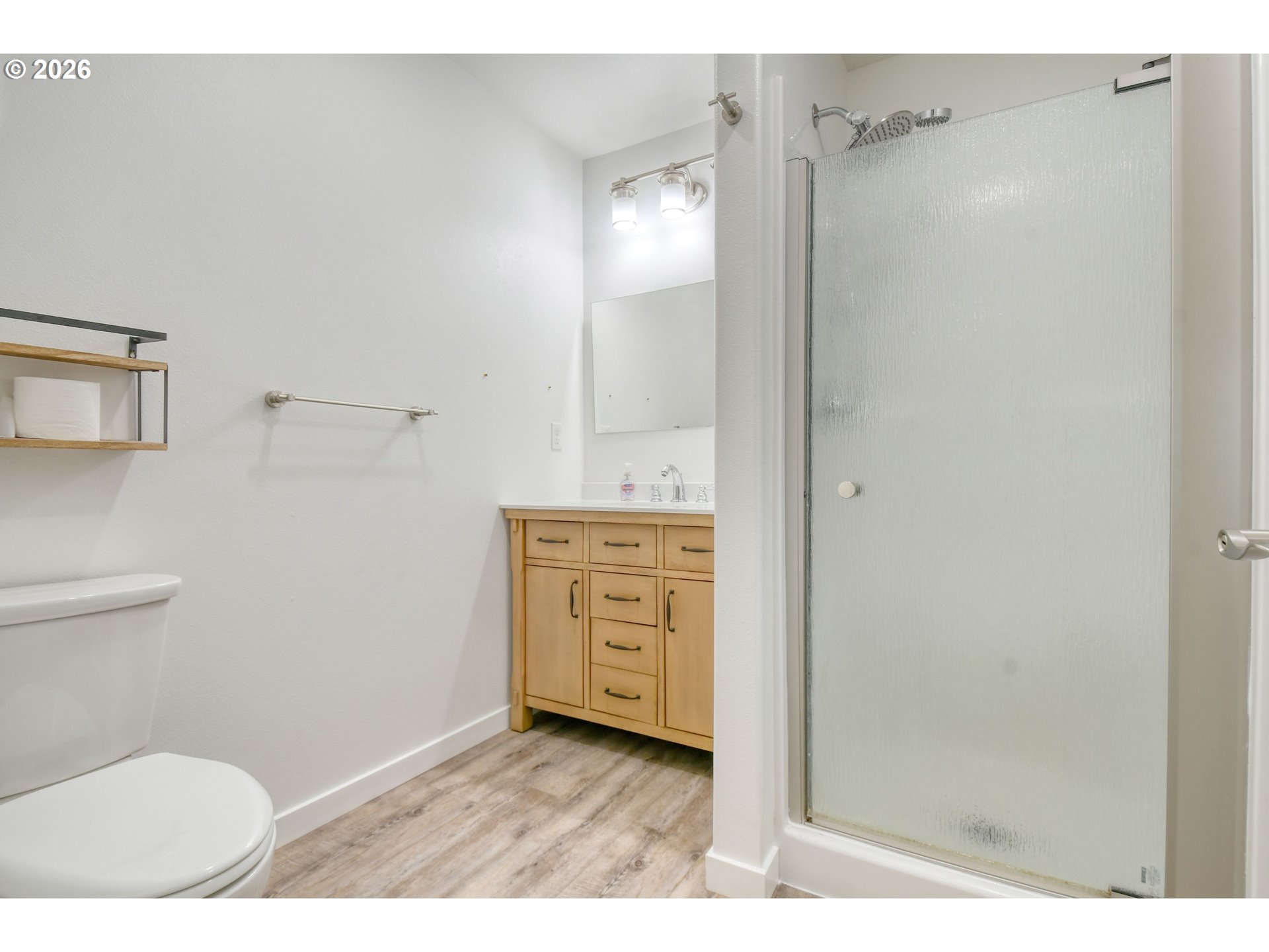2010 Tutuilla Road Pendleton, OR 97801 - Photo 20 of 38 a bathroom with a granite countertop sink toilet and shower