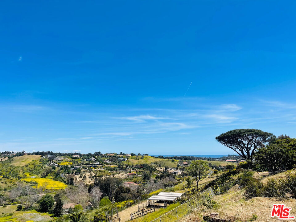 5684 Calpine Drive Malibu, CA 90265 - Photo 3 of 11 a view of lake and mountain