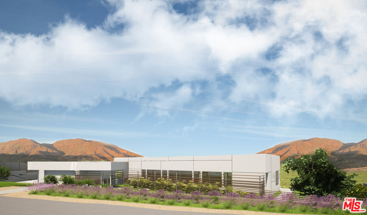 5684 Calpine Drive Malibu, CA 90265 - Photo 4 of 11 a view of houses with sky view