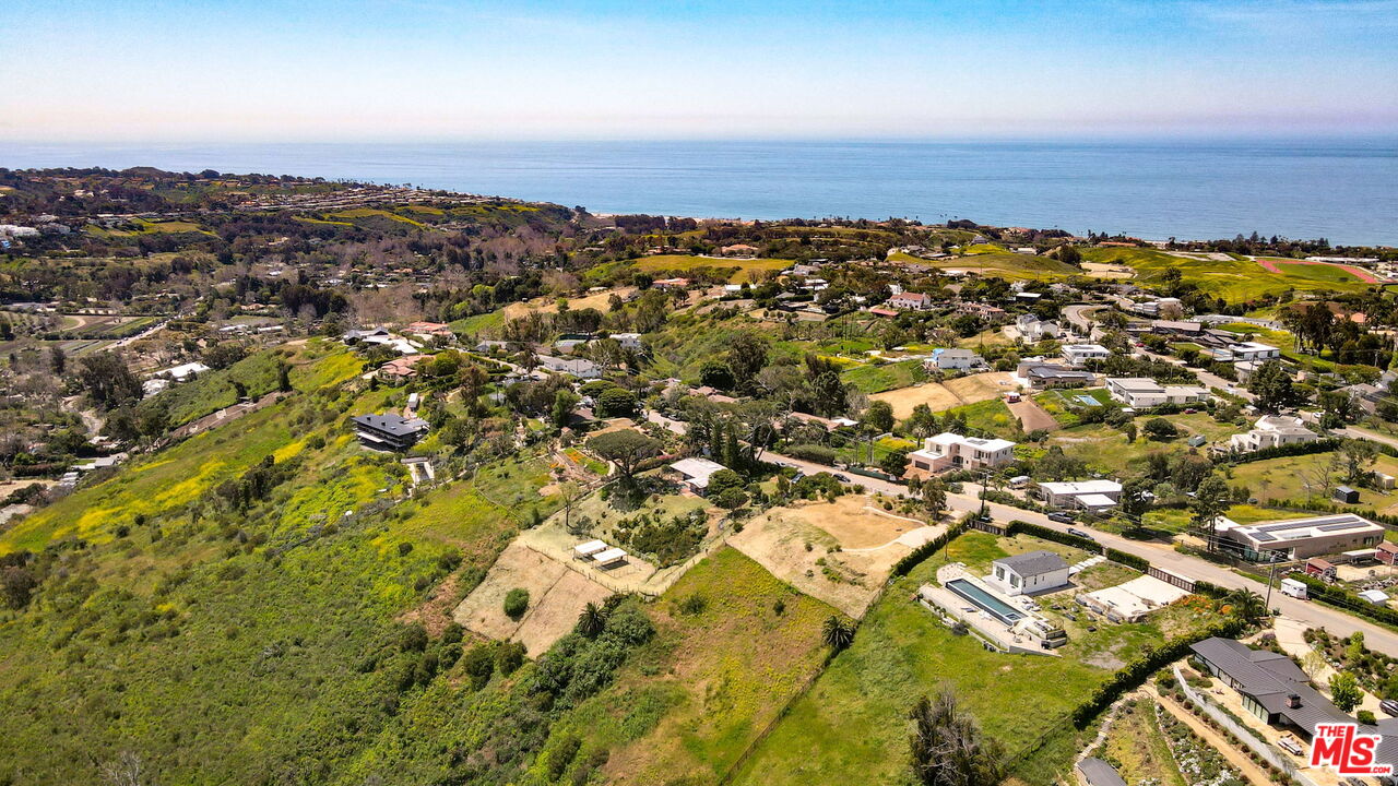5684 Calpine Drive Malibu, CA 90265 - Photo 10 of 11 an aerial view of residential building and ocean