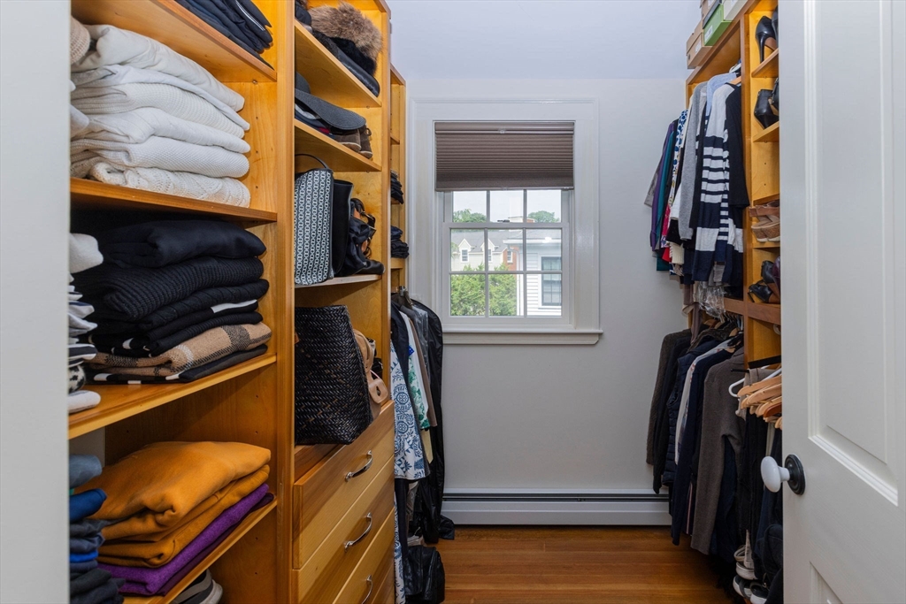 7 Waldron Court Marblehead, MA 01945 - Photo 15 of 26 a view of walk in closet with clothes and shoes