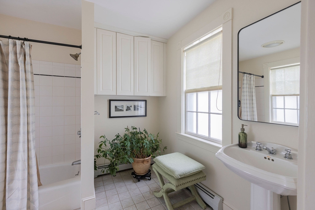 7 Waldron Court Marblehead, MA 01945 - Photo 17 of 26 a bathroom with a sink toilet and shower