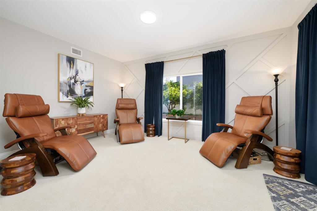 1677 Mission Meadow Drive Oceanside, CA 92057 - Photo 13 of 48 a room with furniture and a large window