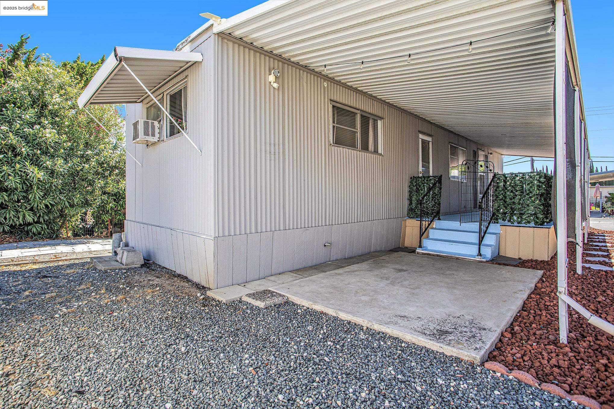 3301 Buchanan Road, Unit 118 Antioch, CA 94509 - Photo 11 of 15 View of property exterior with a carport