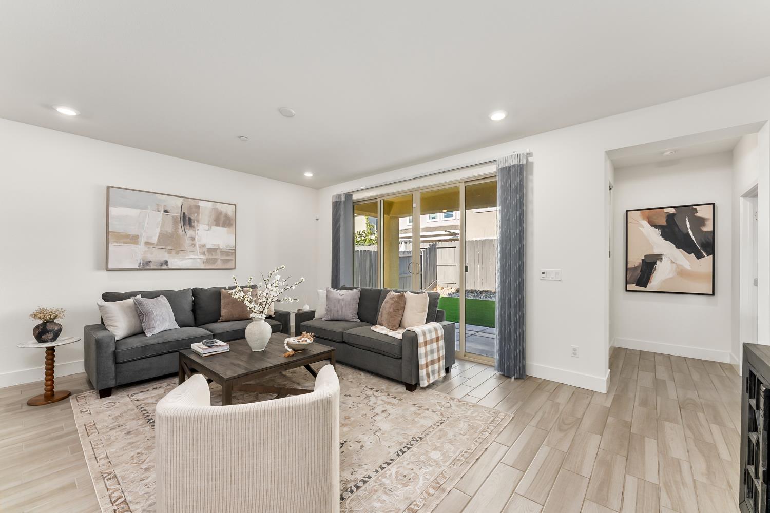 4156 Salt Point Way Rancho Cordova, CA 95742 - Photo 16 of 43 Family room opens up seamlessly to backyard patio