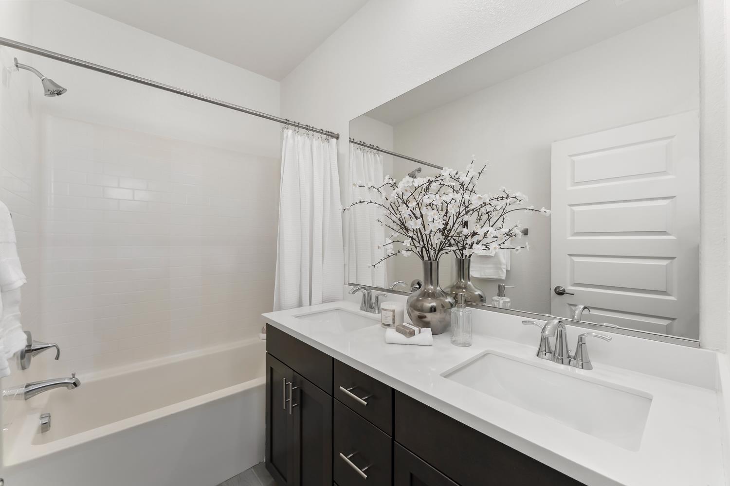 4156 Salt Point Way Rancho Cordova, CA 95742 - Photo 34 of 43 Hall bathroom with dual sinks