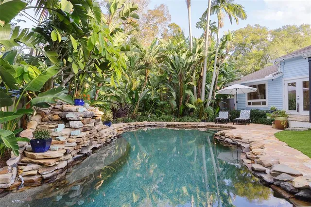 a view of a lake with a yard