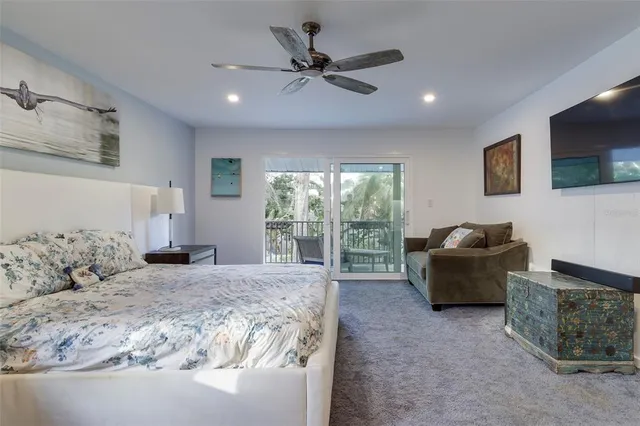 a bathroom with a granite countertop sink a mirror and a bathtub