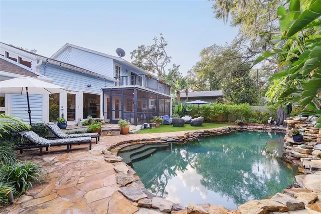 a view of yard with patio