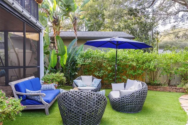 a view of a lake with a house in background