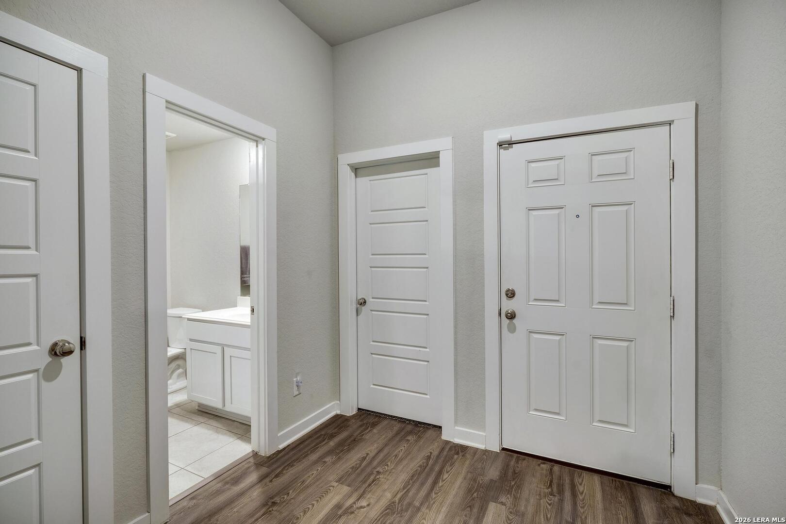 6910 Shiraz Way Converse, TX 78109 - Photo 15 of 25 wooden floor & closet in a room