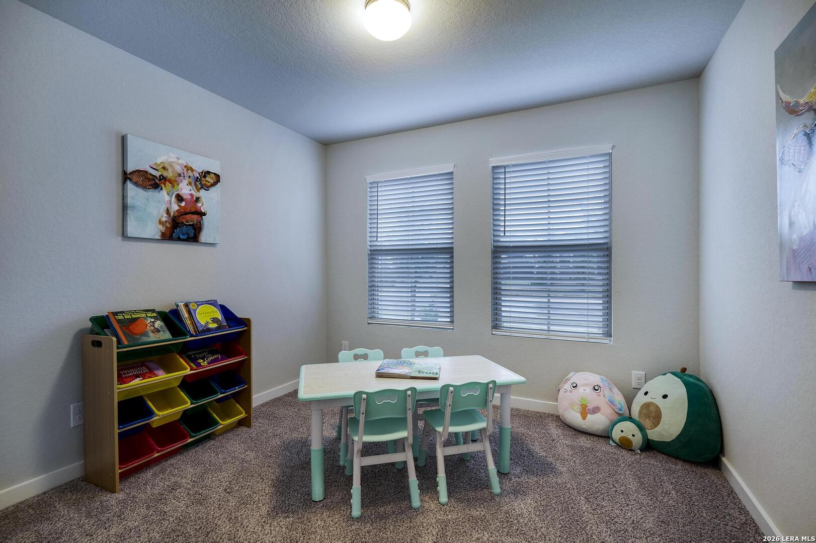 6910 Shiraz Way Converse, TX 78109 - Photo 16 of 25 a dining room with a window