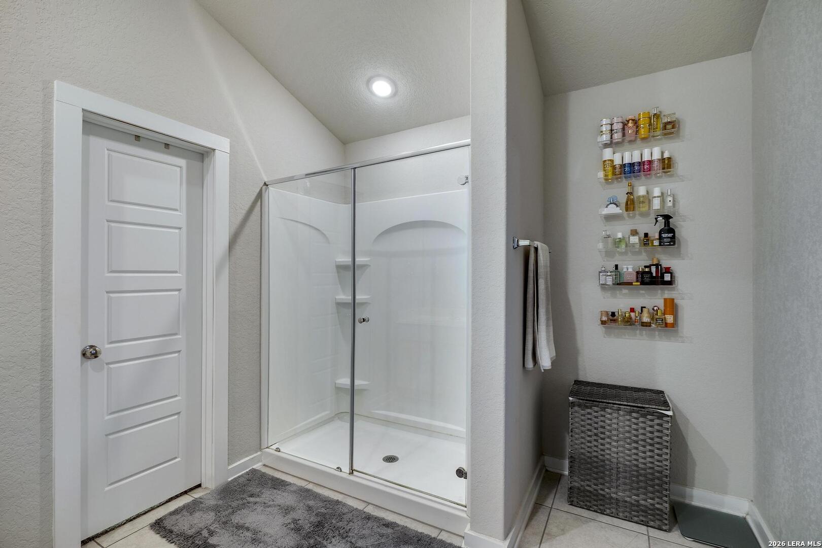 6910 Shiraz Way Converse, TX 78109 - Photo 22 of 25 a bathroom with a shower