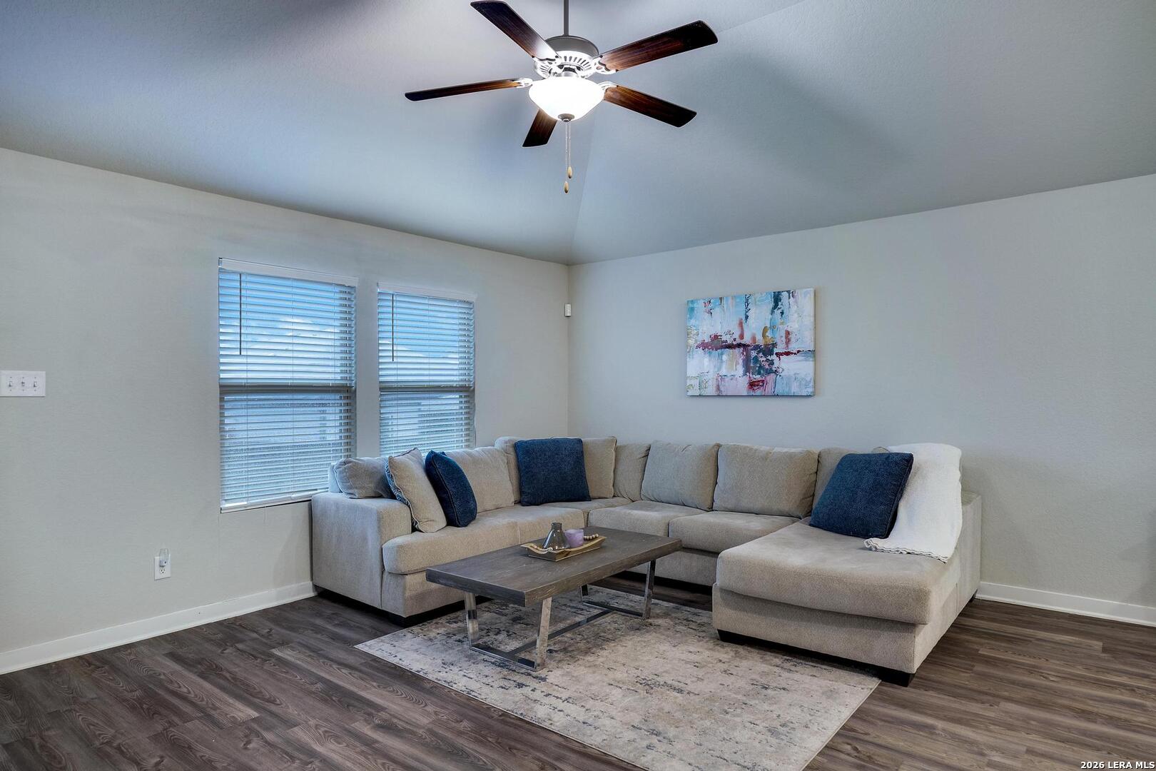 6910 Shiraz Way Converse, TX 78109 - Photo 5 of 25 a living room with furniture and a ceiling fan