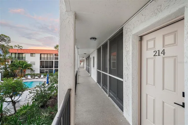 a view of balcony with furniture