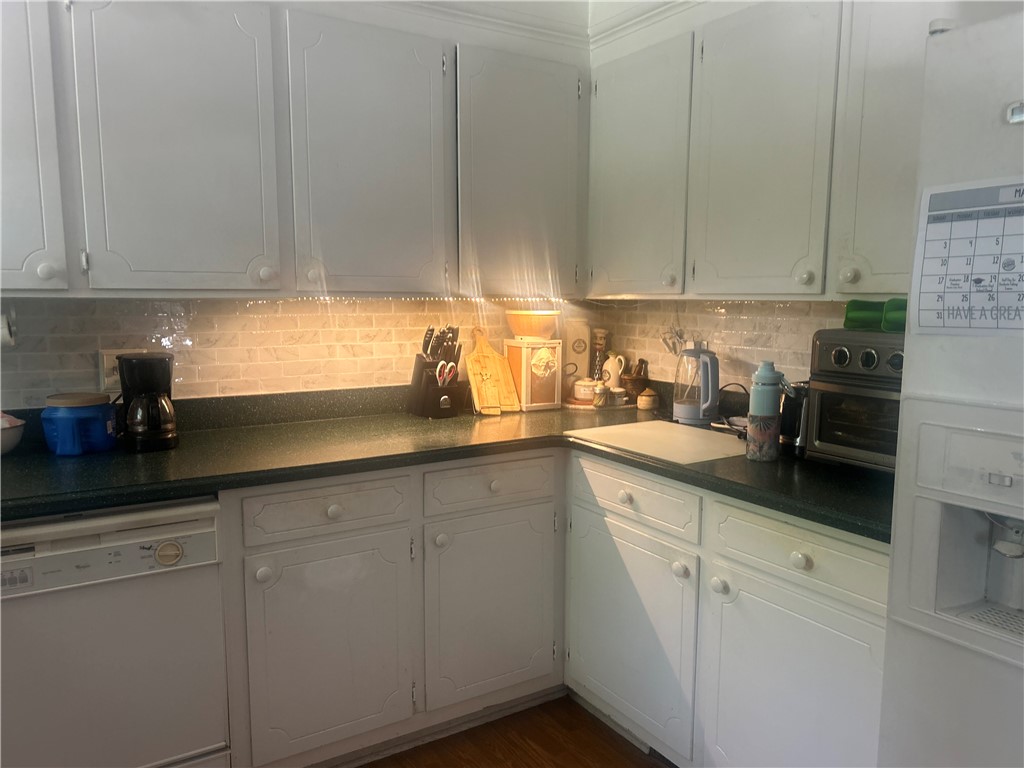418 Saluda Road Williamston, SC 29697 - Photo 25 of 40 Functional kitchen with ample cabinet space and modern appliances.