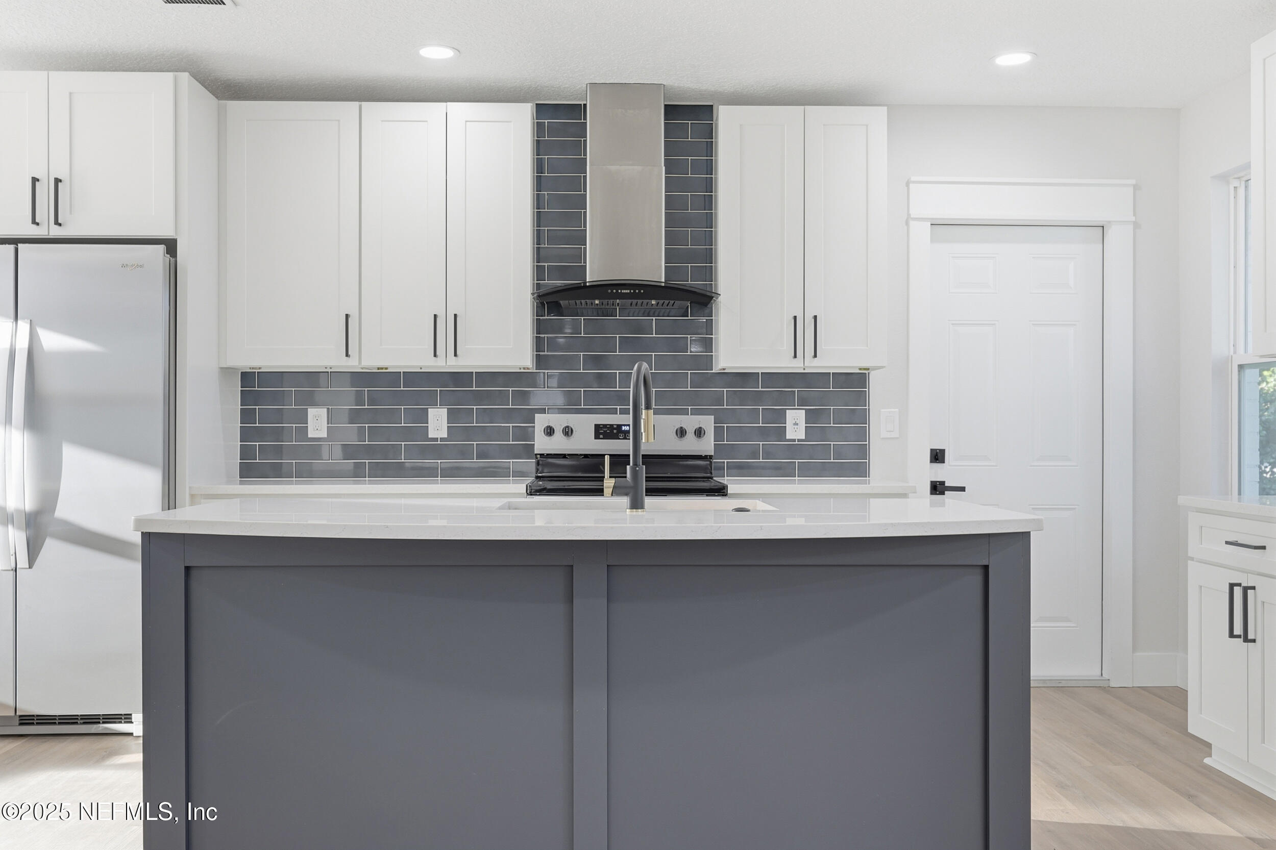 1440 Harbor Oaks Road Jacksonville, FL 32207 - Photo 23 of 63 a kitchen with stainless steel appliances granite countertop a sink stove and cabinets