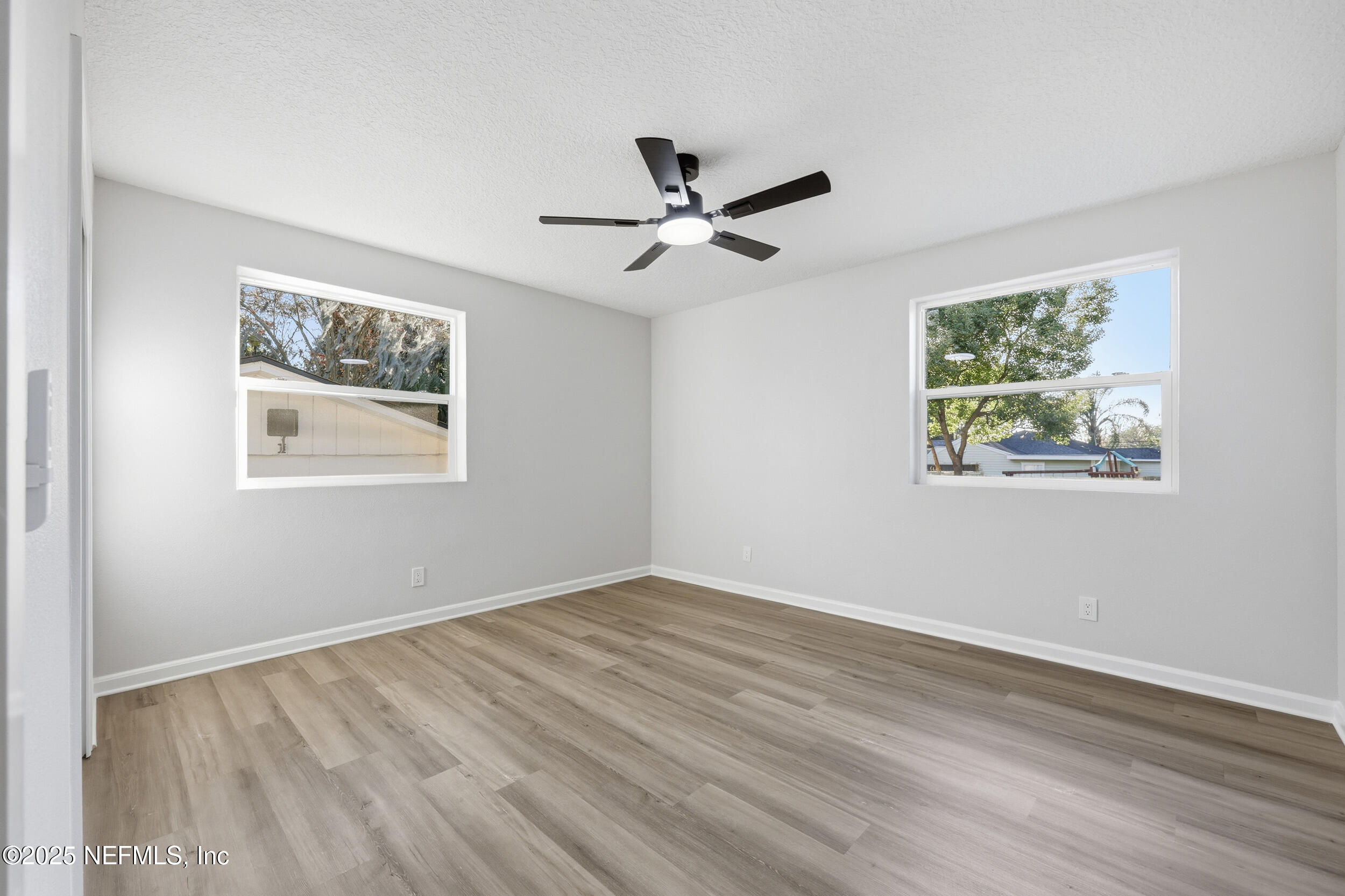 1440 Harbor Oaks Road Jacksonville, FL 32207 - Photo 34 of 63 a view of empty room with wooden floor