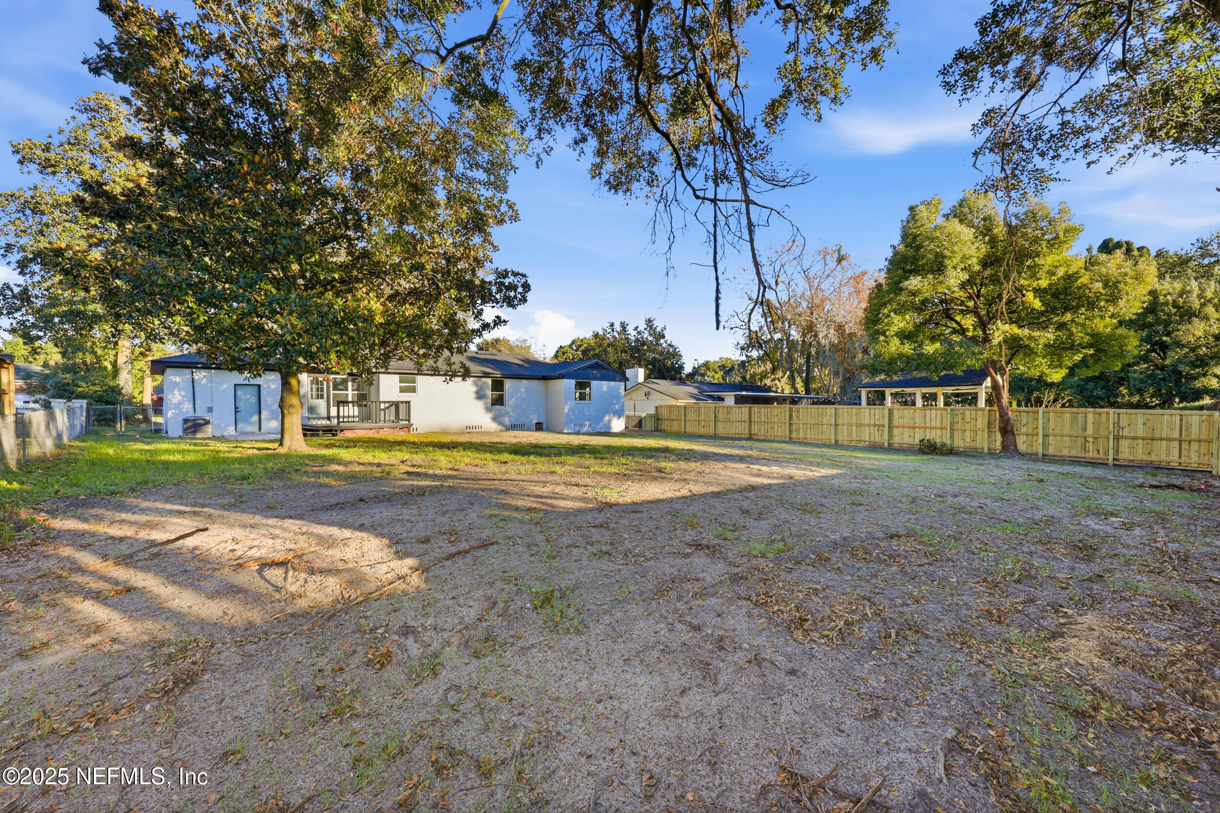 1440 Harbor Oaks Road Jacksonville, FL 32207 - Photo 44 of 63 a view of swimming pool with tree s