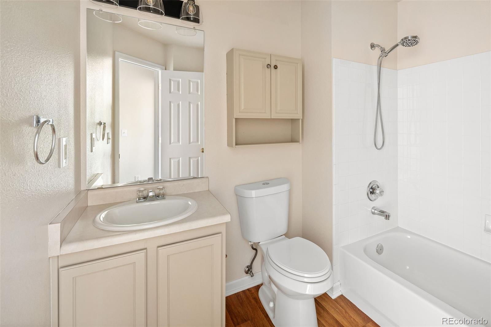 9741 Moss Rose Circle Highlands Ranch, CO 80129 - Photo 31 of 46 a bathroom with a sink toilet and shower
