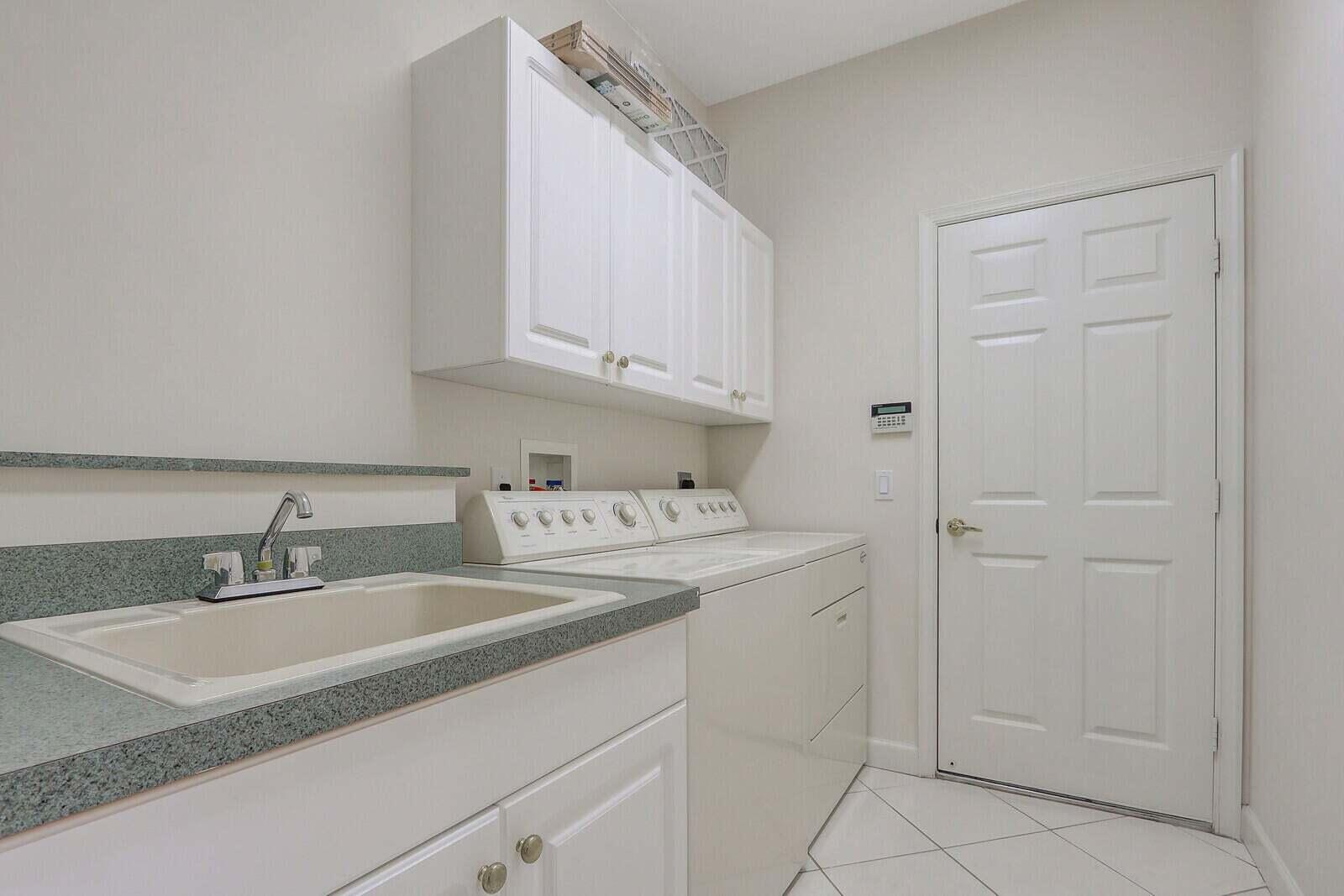 8829 First Tee Road Port St. Lucie, FL 34986 - Photo 30 of 42 Laundry