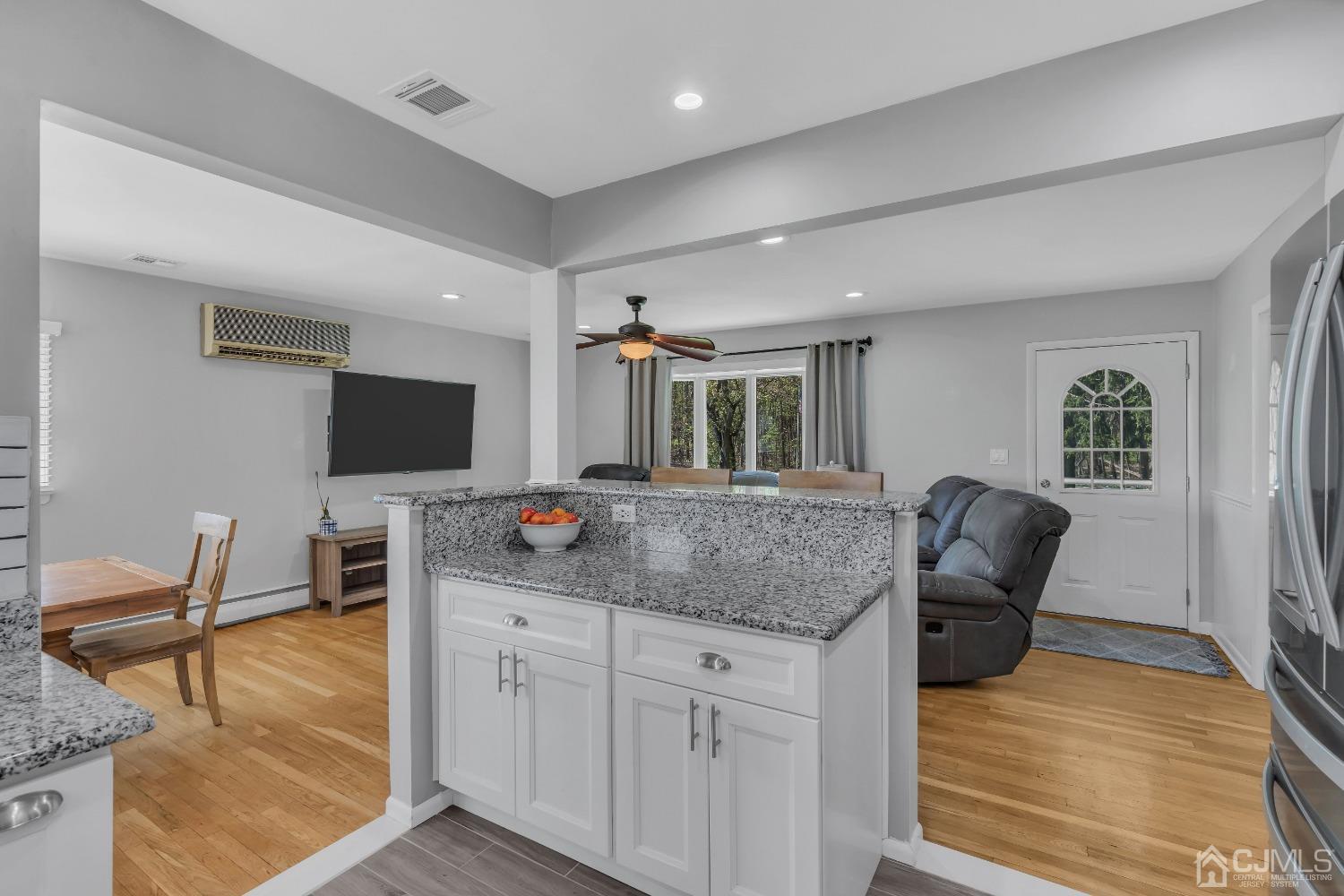 247 Davidson's Mill Road Monroe Township, NJ 08831 - Photo 13 of 55 a kitchen with stainless steel appliances granite countertop a stove and a sink