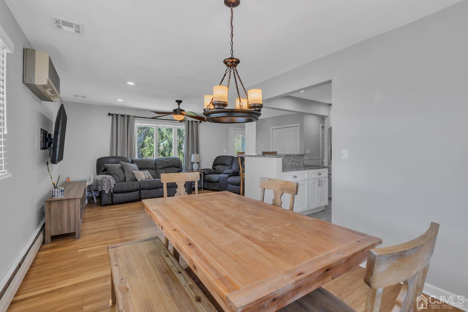 247 Davidson's Mill Road Monroe Township, NJ 08831 - Photo 19 of 55 a view of a dining room with furniture window and wooden floor