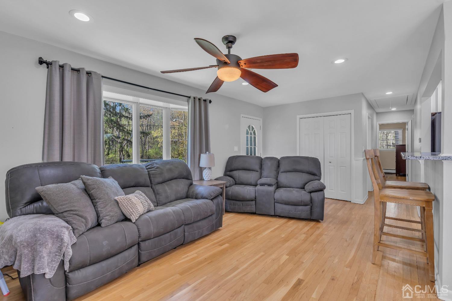 247 Davidson's Mill Road Monroe Township, NJ 08831 - Photo 22 of 55 a living room with furniture and a large window