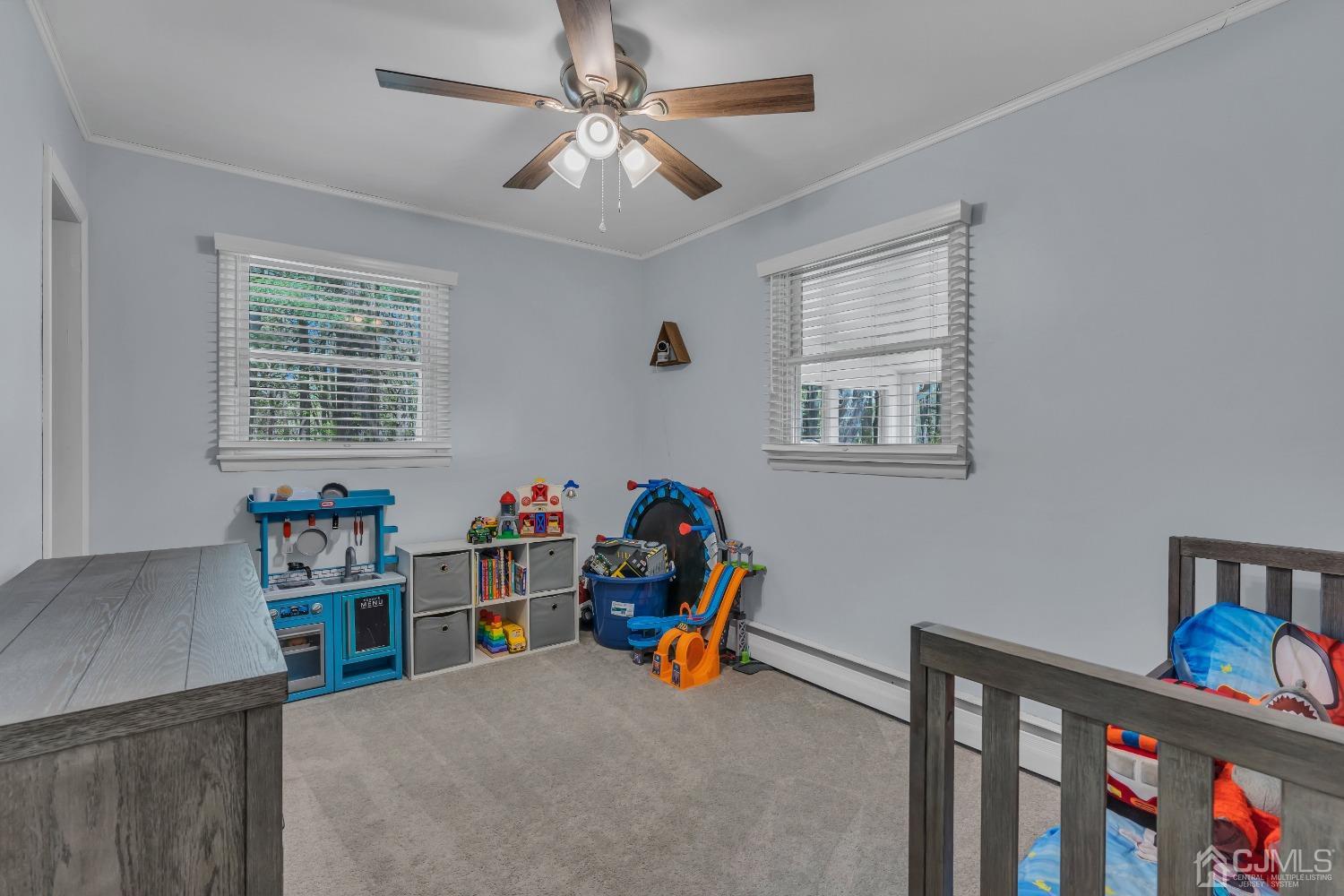 247 Davidson's Mill Road Monroe Township, NJ 08831 - Photo 23 of 55 a children room with toys and a window