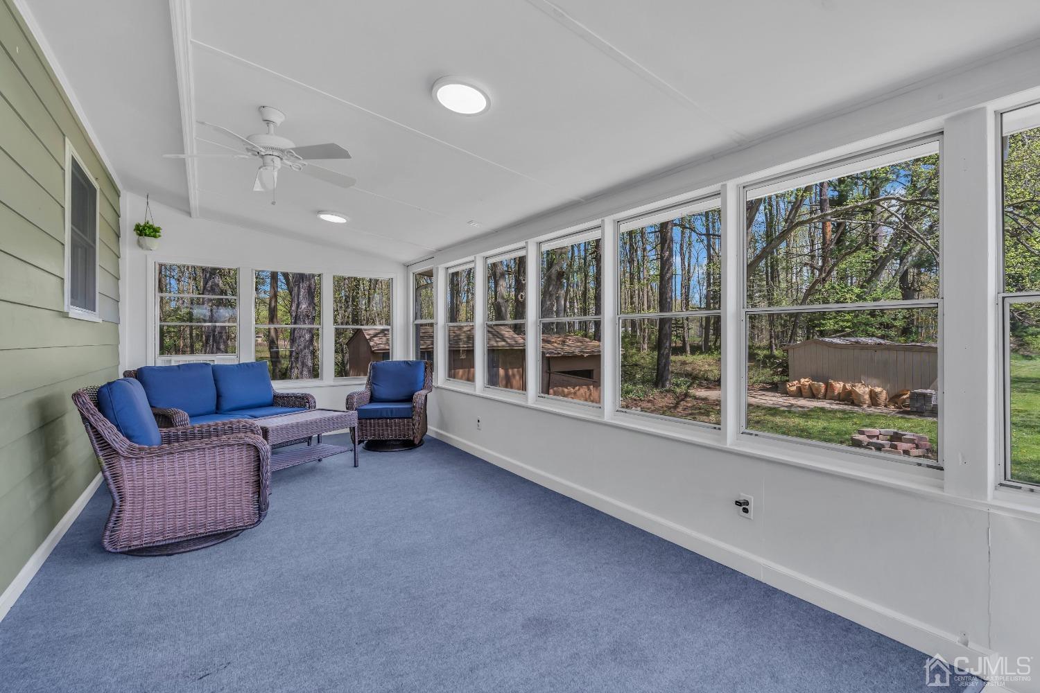 247 Davidson's Mill Road Monroe Township, NJ 08831 - Photo 32 of 55 a living room with furniture and a large window
