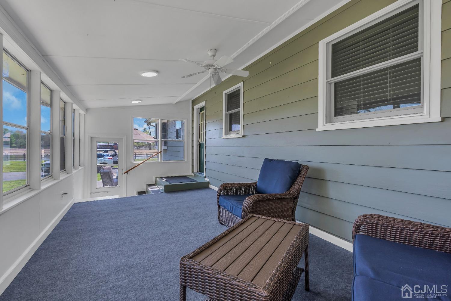 247 Davidson's Mill Road Monroe Township, NJ 08831 - Photo 33 of 55 a view of living room filled with furniture and large windows