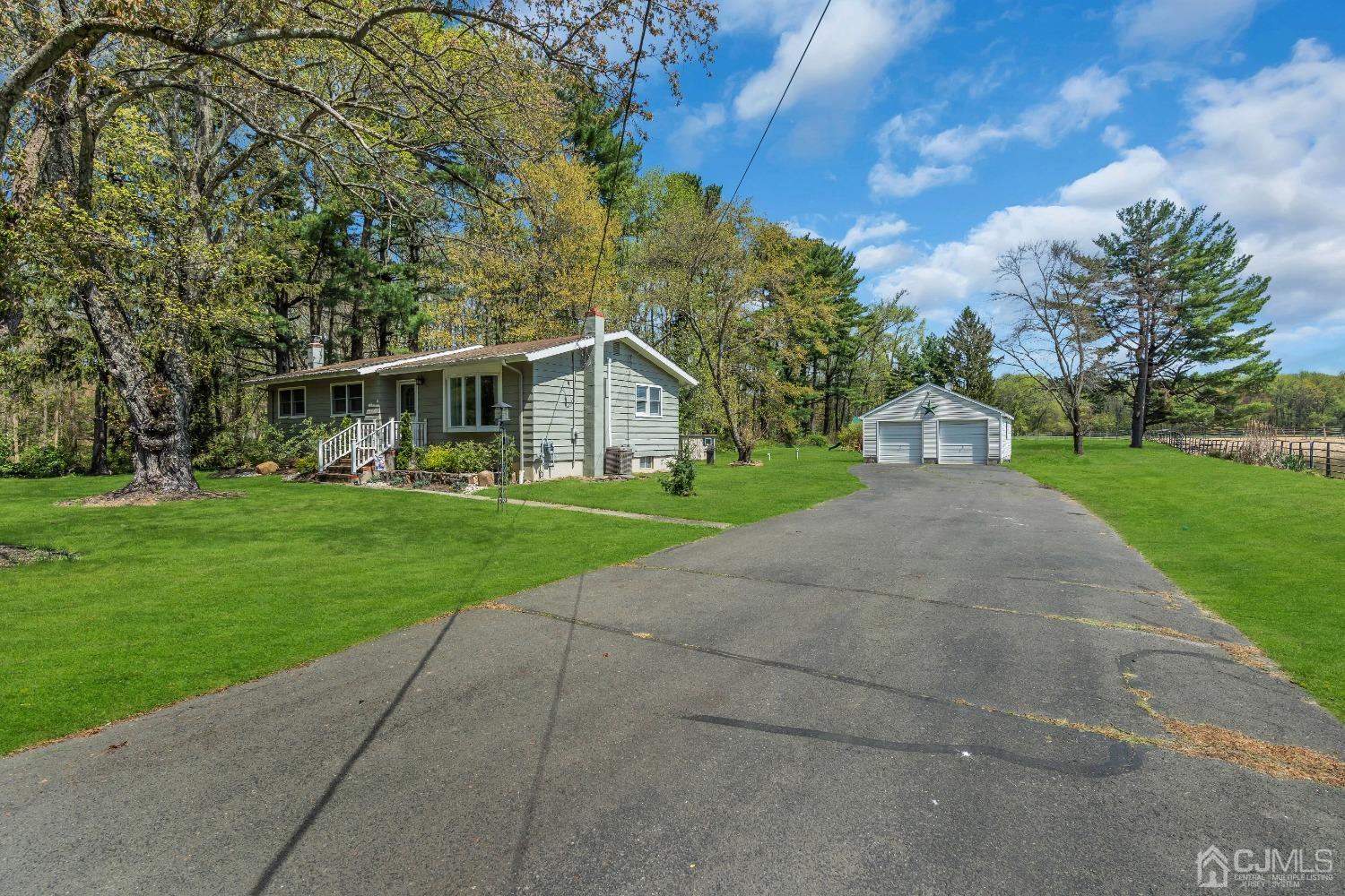 247 Davidson's Mill Road Monroe Township, NJ 08831 - Photo 34 of 55 a view of house with yard and green space