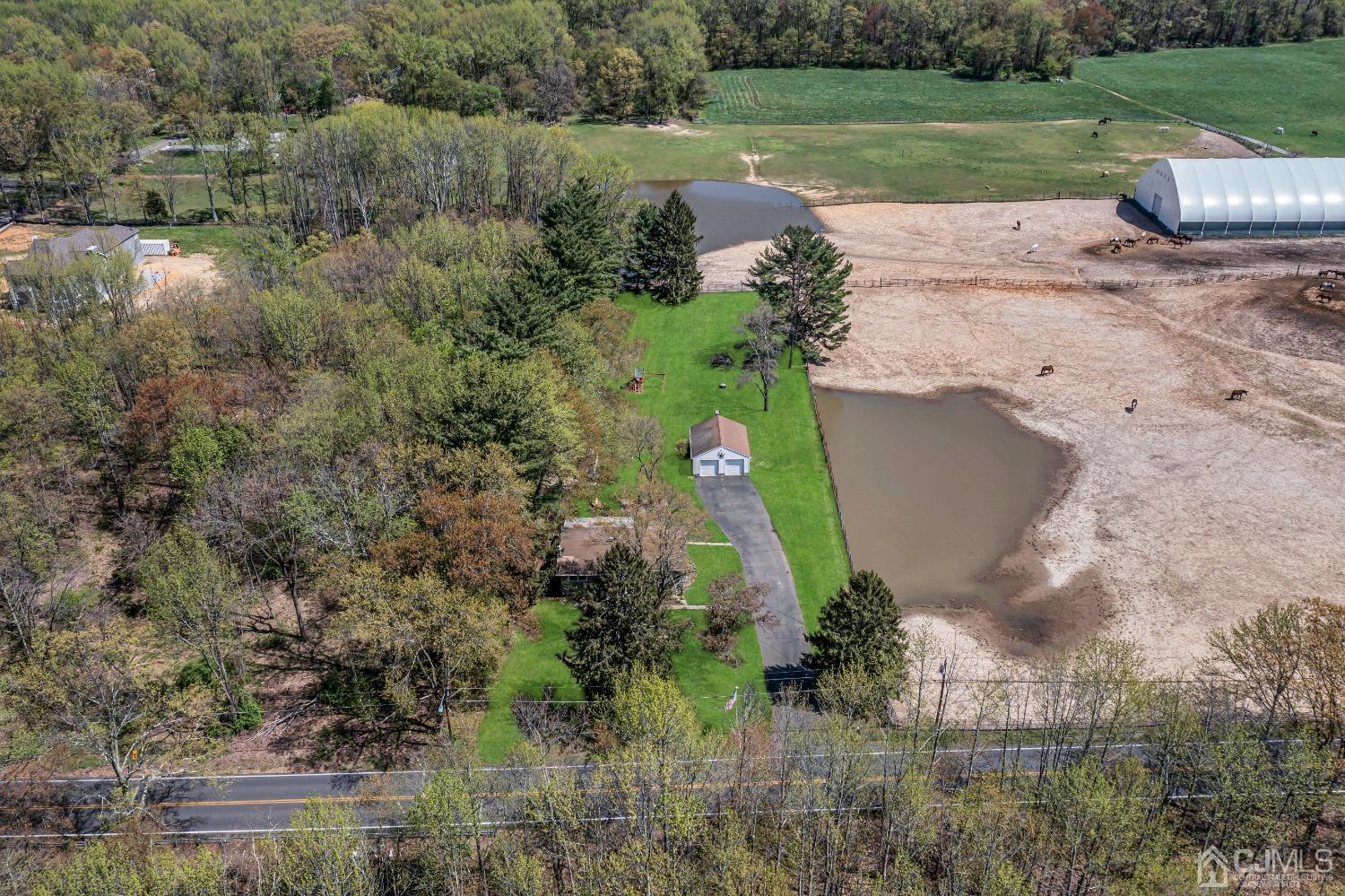 247 Davidson's Mill Road Monroe Township, NJ 08831 - Photo 43 of 55 a view of a street with a park