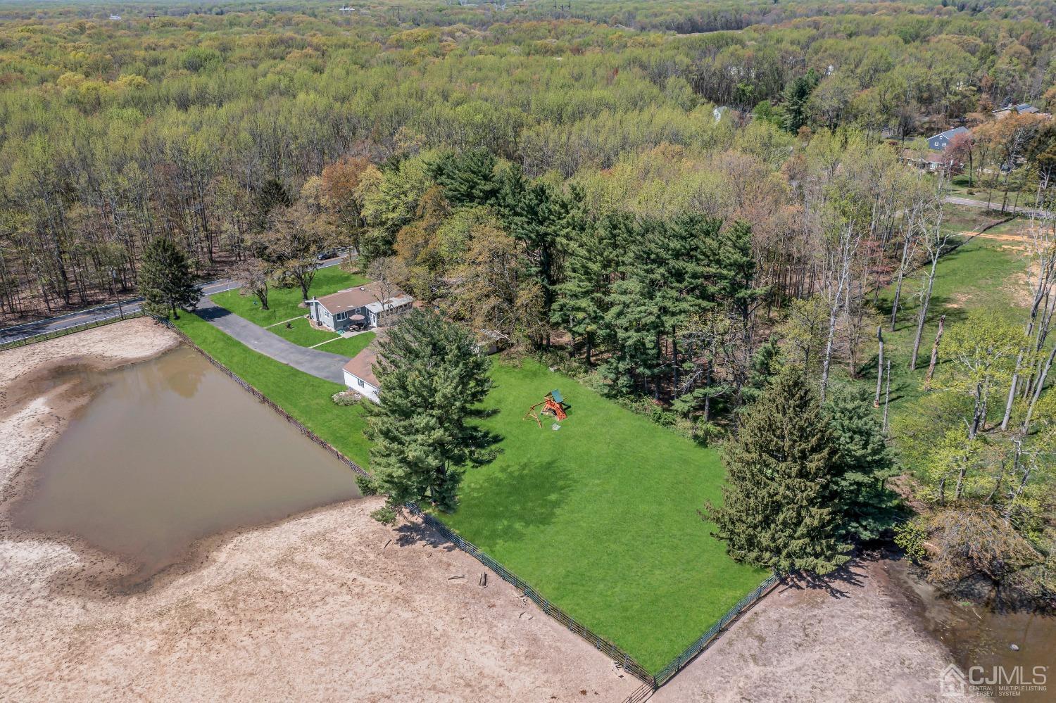 247 Davidson's Mill Road Monroe Township, NJ 08831 - Photo 45 of 55 a view of a garden with a pathway