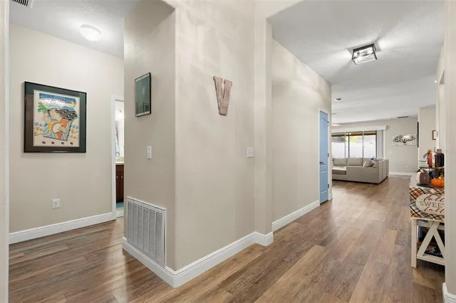 a view of livingroom with furniture and wooden floor