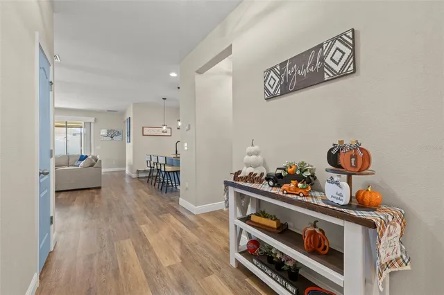 a storage room with furniture and wooden floor