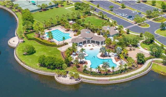 a view of a swimming pool from a dining room