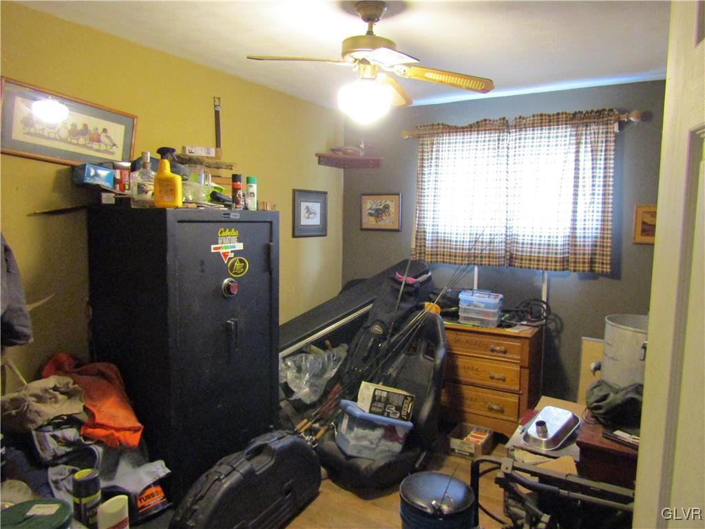210 Clearview Avenue Shavertown, PA 18708 - Photo 11 of 12 a bedroom with a bed and wooden floor