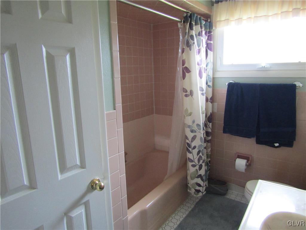 210 Clearview Avenue Shavertown, PA 18708 - Photo 12 of 12 a bathroom with a shower and a toilet