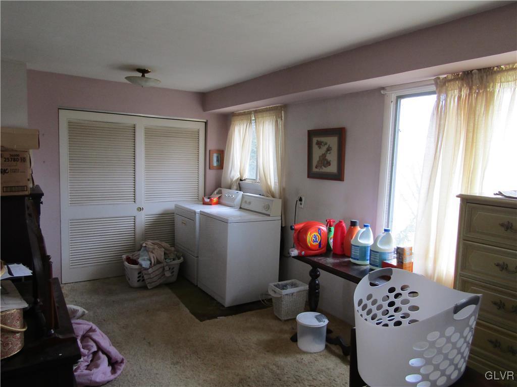 210 Clearview Avenue Shavertown, PA 18708 - Photo 8 of 12 a living room with furniture and a window