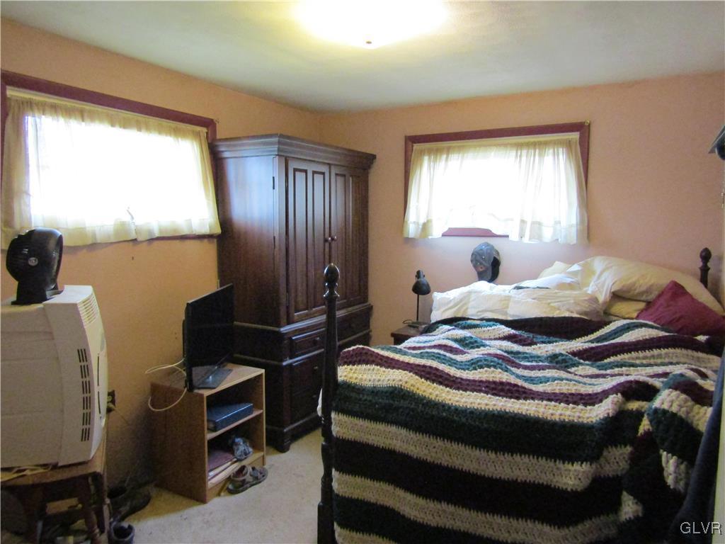210 Clearview Avenue Shavertown, PA 18708 - Photo 10 of 12 a bedroom with a bed and windows