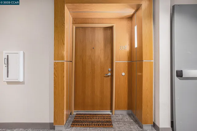 a view of a kitchen from the hallway