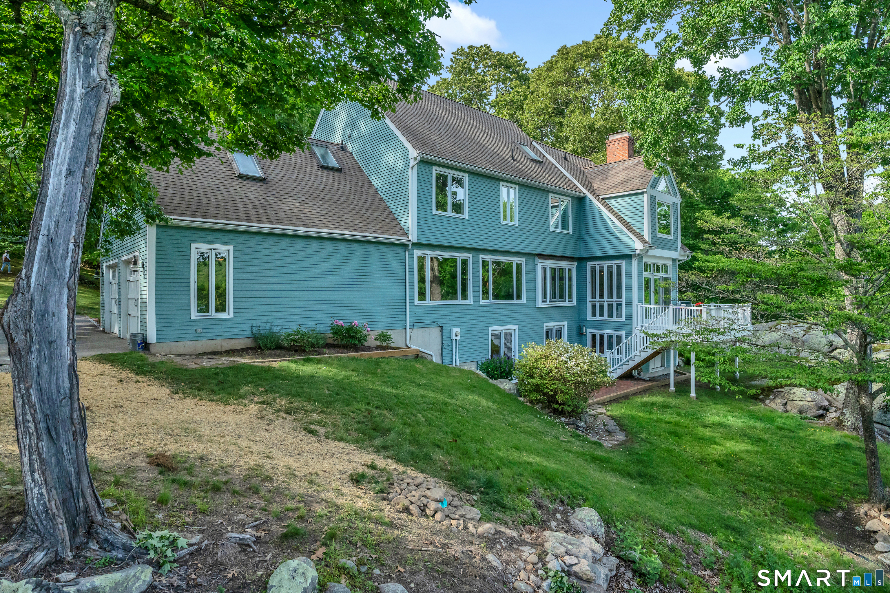 253-4 Grassy Hill Road Lyme, CT 06371 - Photo 3 of 40 expansive windows capture the view
