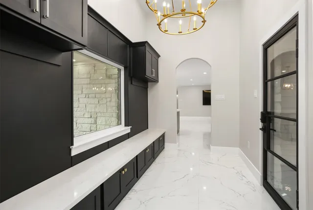 a utility room with a sink a washer and dryer