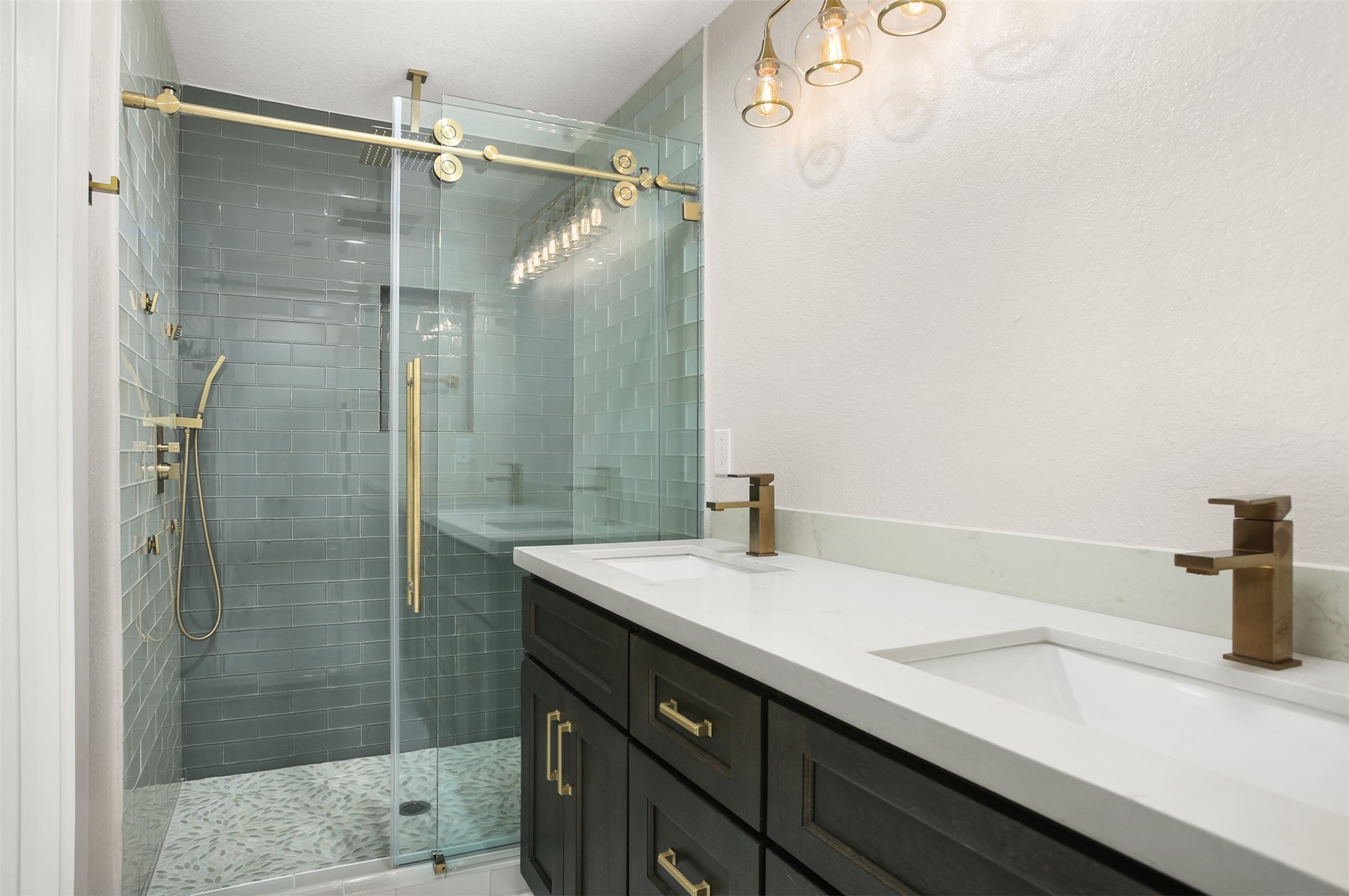 4002 Dixie Farm Road Pearland, TX 77581 - Photo 15 of 29 a bathroom with a sink and a shower