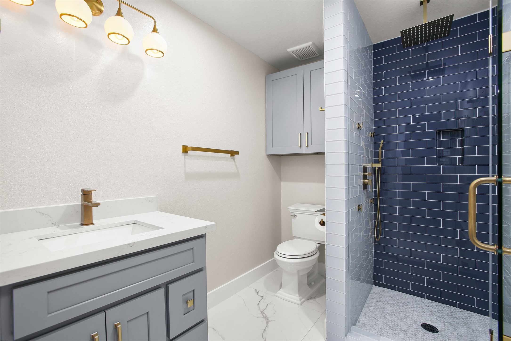 4002 Dixie Farm Road Pearland, TX 77581 - Photo 23 of 29 a bathroom with a sink a toilet and shower