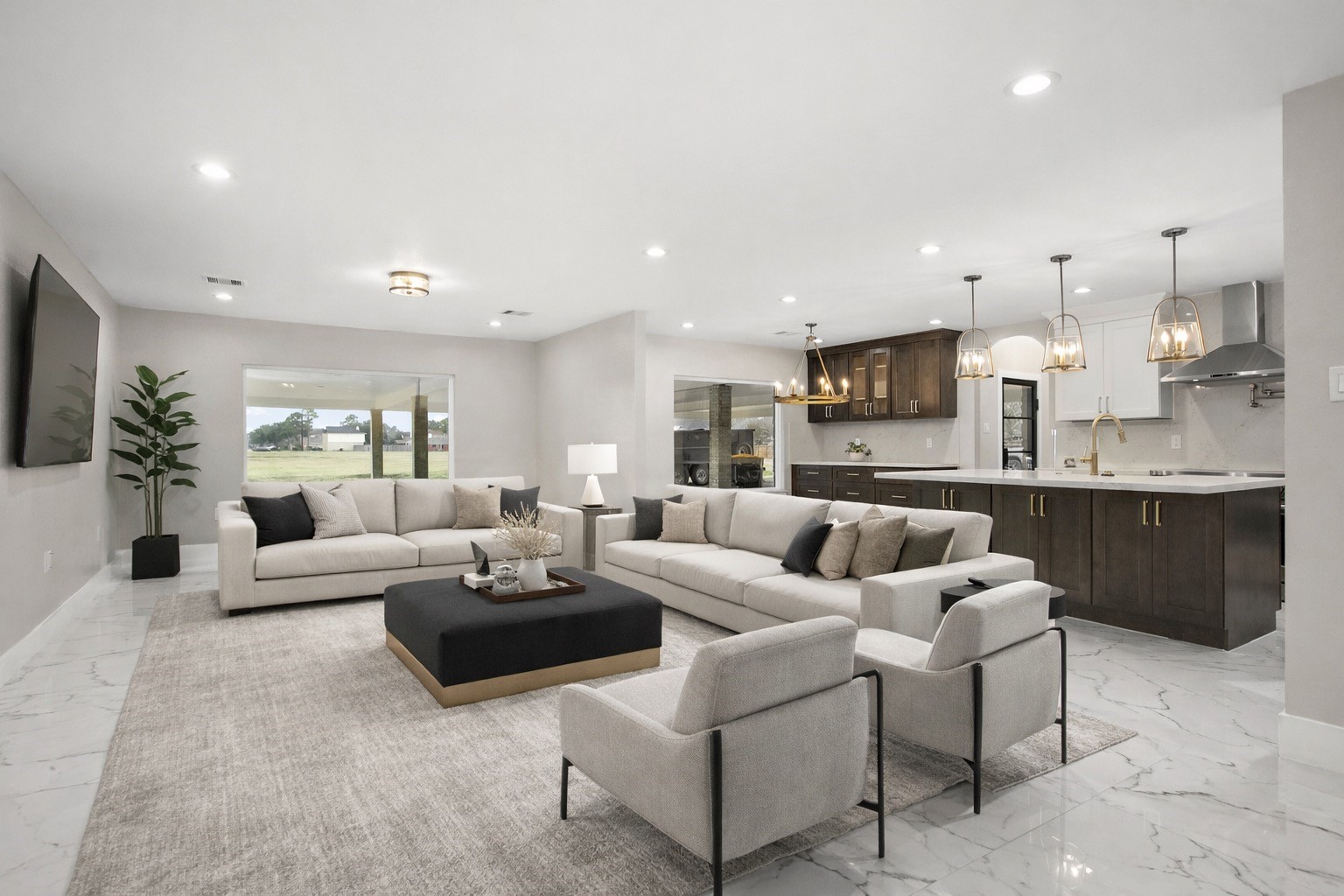 4002 Dixie Farm Road Pearland, TX 77581 - Photo 5 of 29 a living room with furniture white walls and kitchen view
